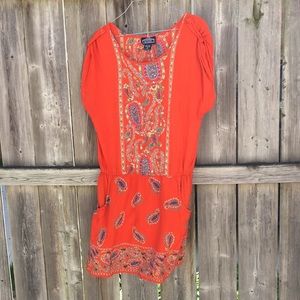 Orange print dress.